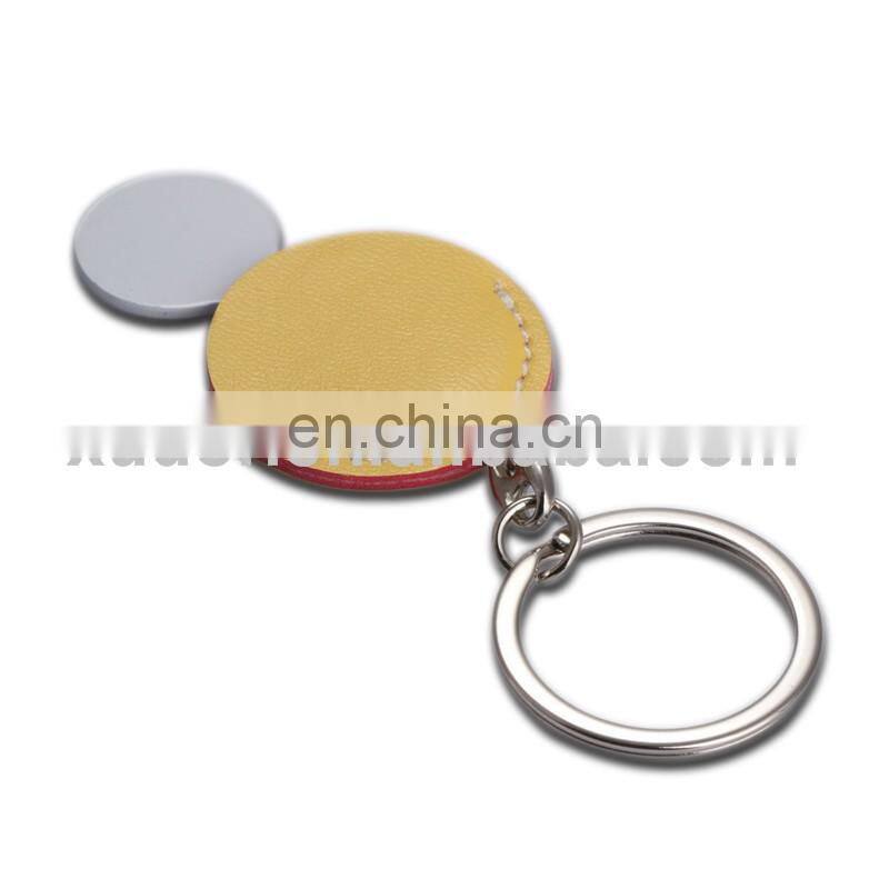 Round metal logo yellow leather keychains