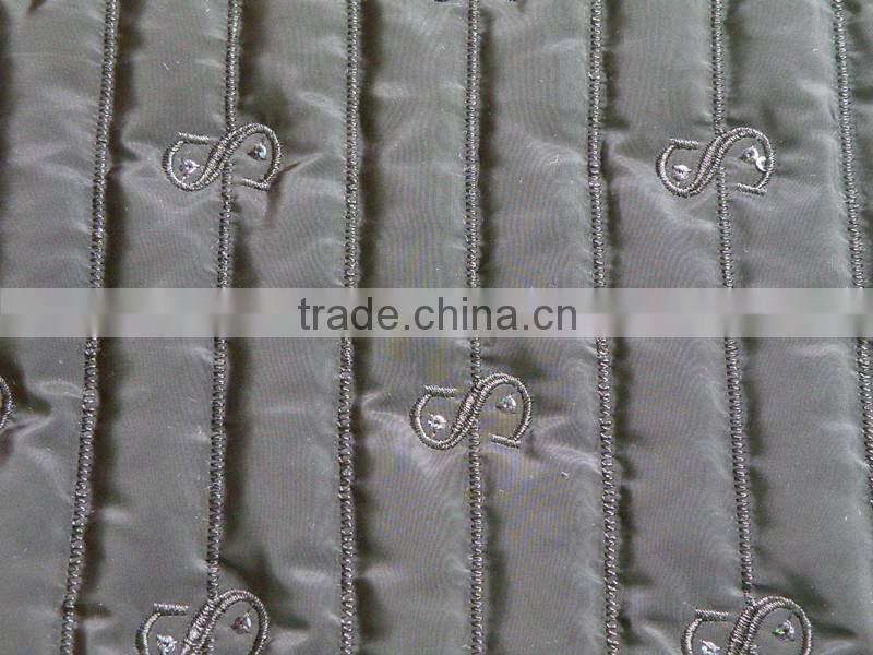 Fashion polyester stripe embroidered thermal padded fabric with quilting for down coats/jacket