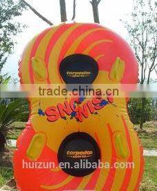 Double snow tube , snow float , skiiling