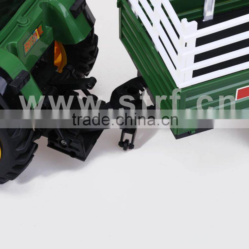 Toy Green color tractor pulling with tailer