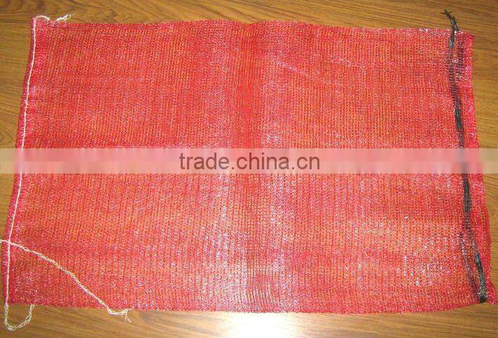 Tubular mesh bag with drawstring for packing vegetables