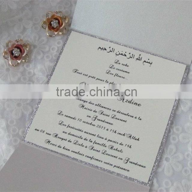 Attractive white lace wedding invitation cards with pink ribbons and brooches