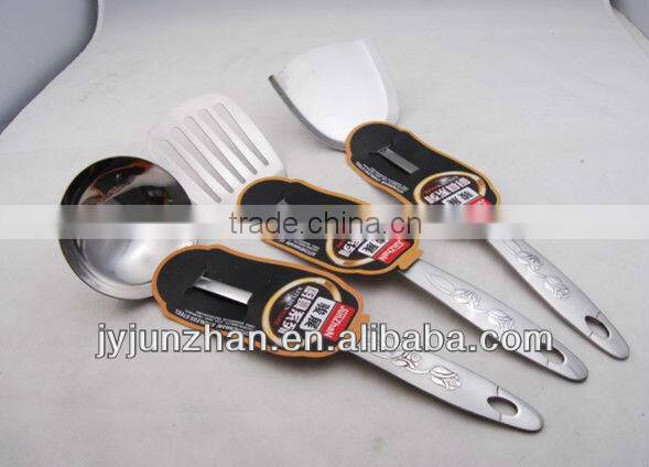 Stainless slotted turner with SS handle with rose on and low price