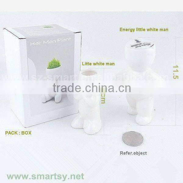 Energy little white man growing grass doll