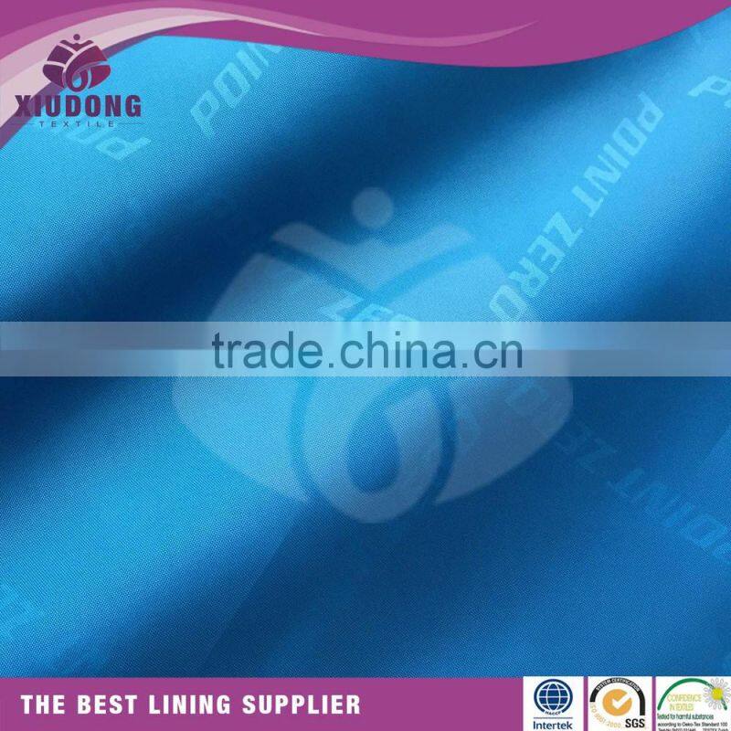 2015 hot sale 190T polyester embossed taffeta with logo design fabric