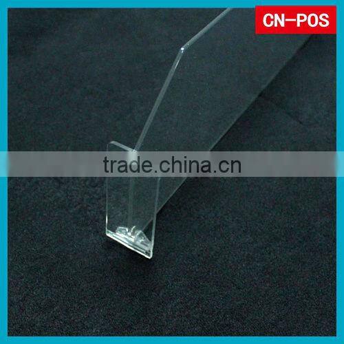 supermarket displaying plastic divider for goods