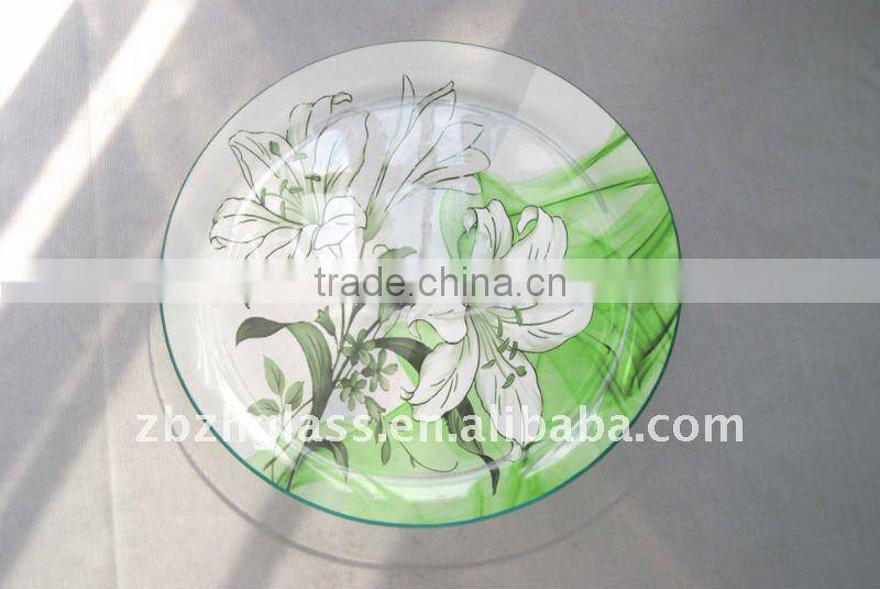 round glass plate with flower design