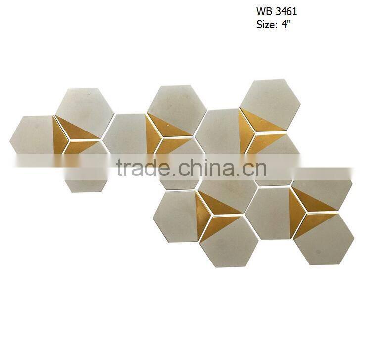 Hexagon concrete tiles with the gold painted tips