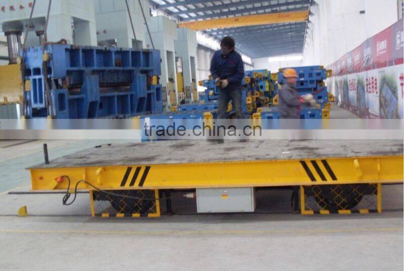 Metal industry using electric flatbed rail trolley