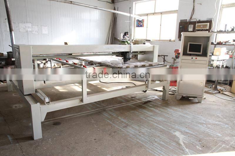 Continuous computerized single needle quilting machine mattress machine