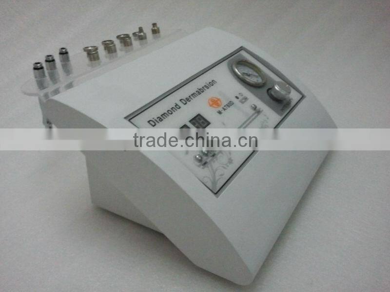 Portable diamond tip microdermabrasion machine