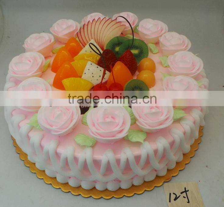 Artificial wedding/anniversary/birthday cake with fake fruits decoration