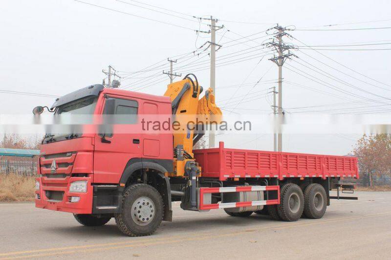 howo 6*4 18T crane truck gets up with the heavy and transport vehicle truck with loading crane