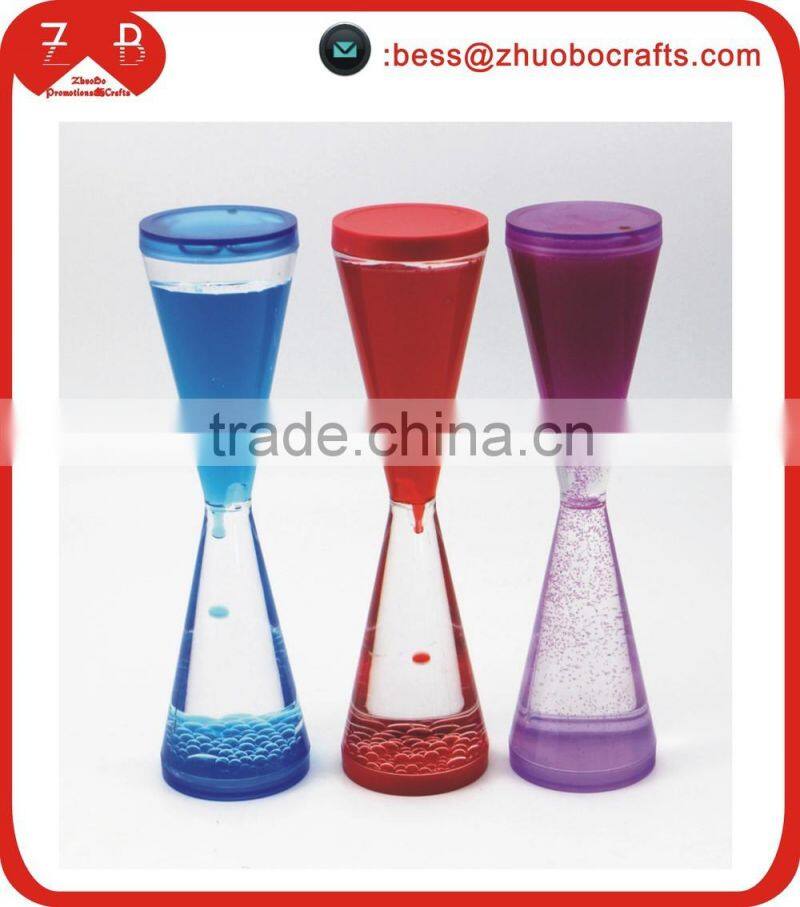 Dynamic oil liquid hourglass