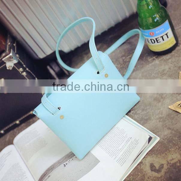 Newest fashion triangle girls pu sling bag