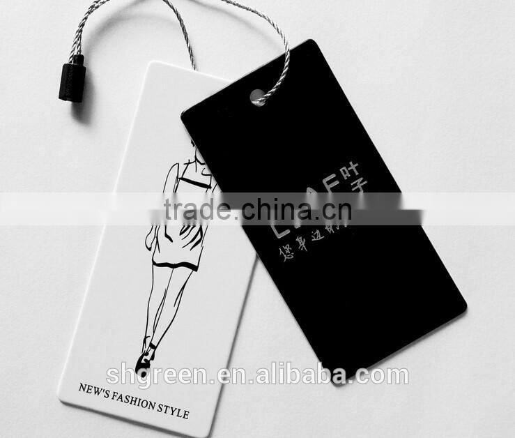 Die-cut paper swing tag with gold metal ballchain