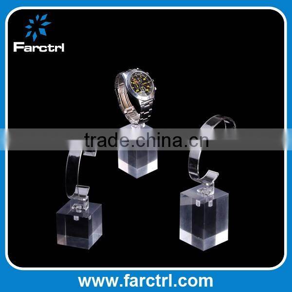 Clear acrylic bracelet watch display holder stand in retail shop