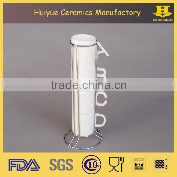 White ceramic tea cup set with metal stand, bone china cup