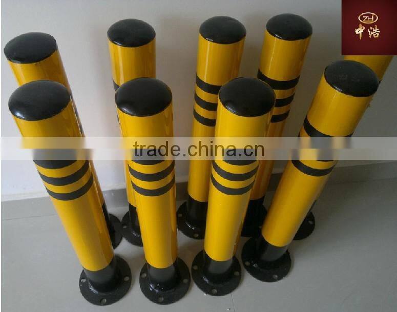 Black and yellow road safety steel warning posts