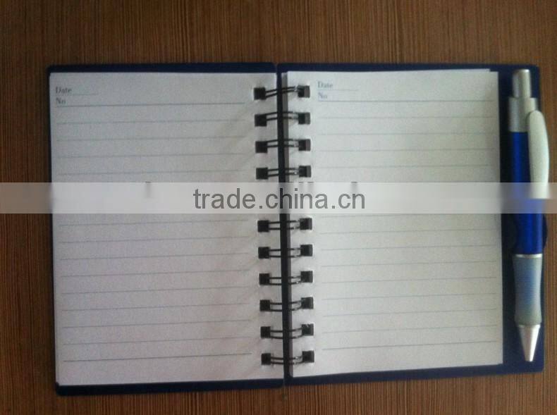 Red color pp sprial notebook with pen