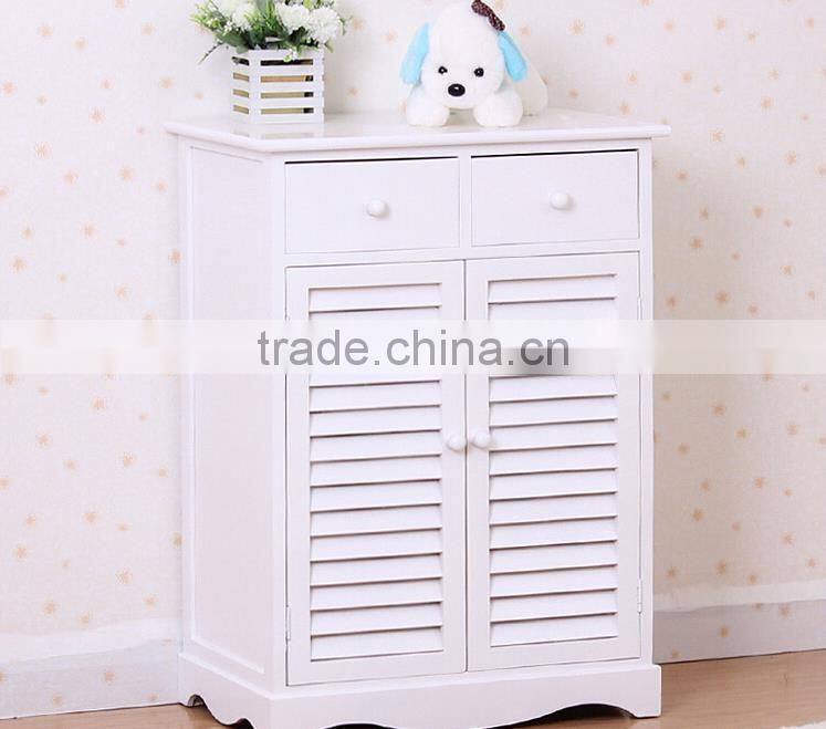 The entrance of the white blinds double door shoe cabinet
