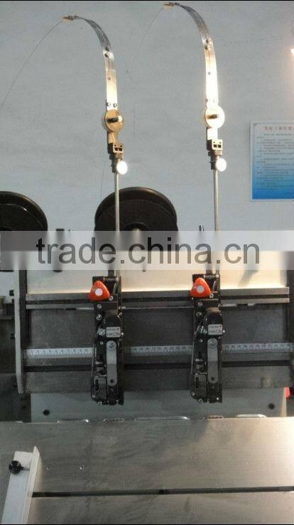Semi-automatic double stitcher binding machine