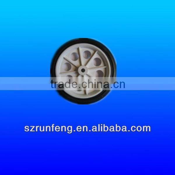 Plastic wheel on luggage box
