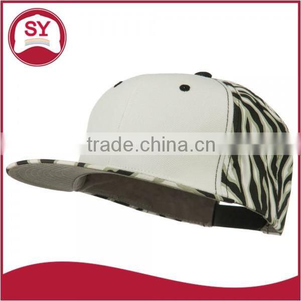 Short brim snapback hat with an adjustable plastic snapback strap closure