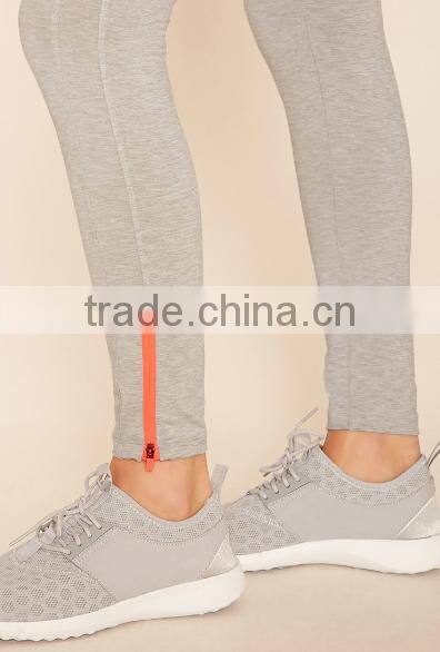 hot sale China women clothing custom yoga fashion elastic plain skinny zip leggings