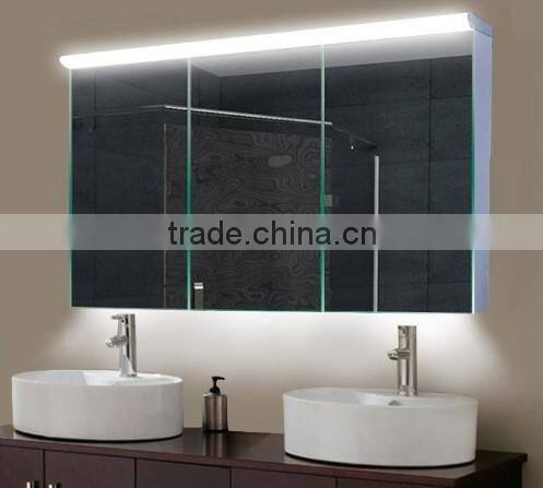 Thee Doors cabinet with vertical LED illumination and mirrored sides.