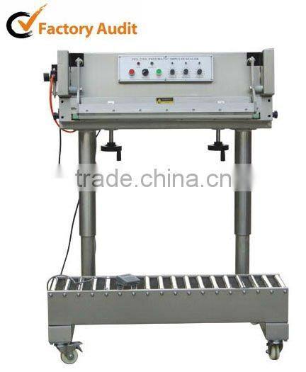 penumatic sealing machine with conveyor
