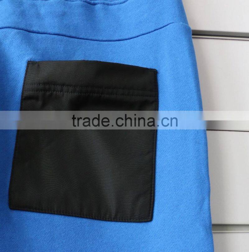 100% cotton men jogging pants with side waterproof pockets and logo print