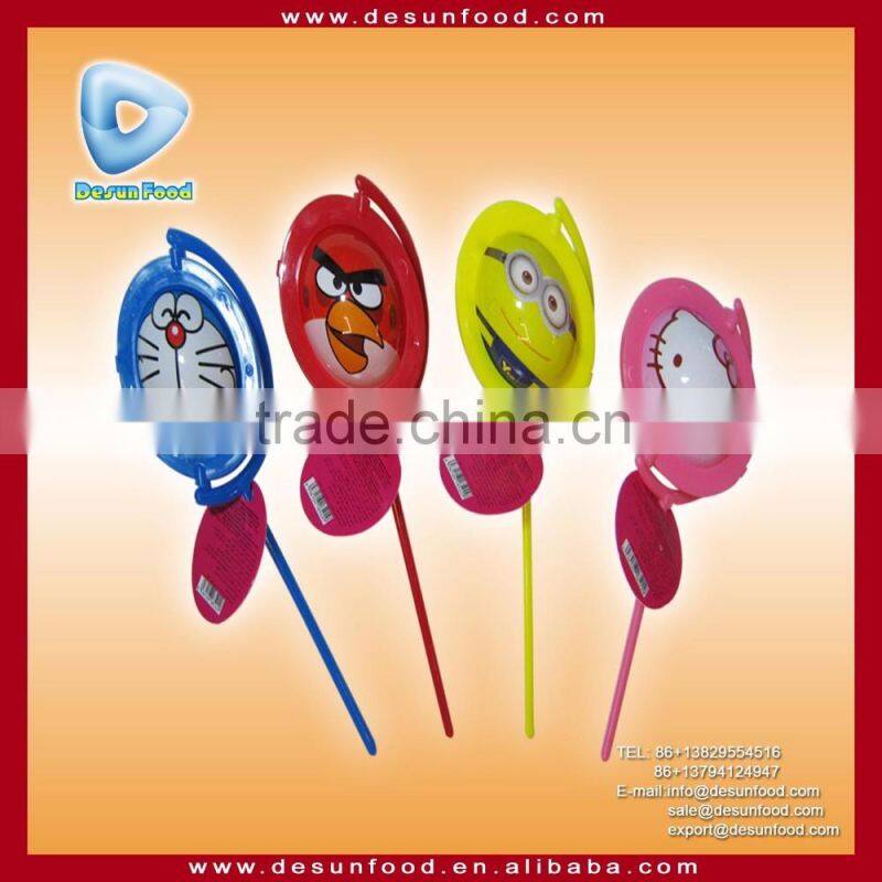 assorted cartoon design rotating face toy candy