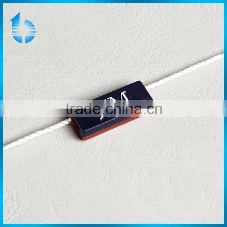 Single insertion plastic seal tag for garments hang tag lock