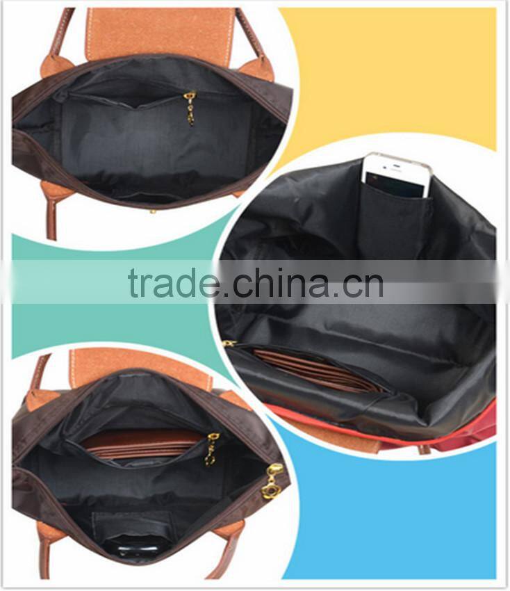 Foldable nylon shopping bag with zipper and button closure