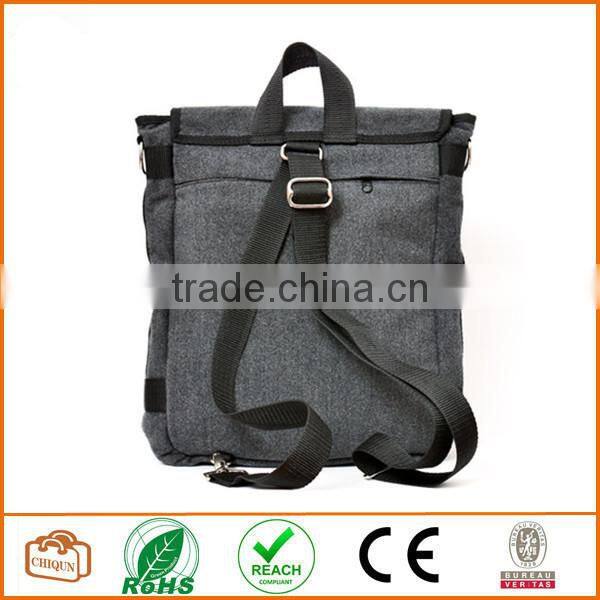 Unisex messenger bag and backpack. Grey Wool-Polyester mix with green details and lining. Multiple pockets