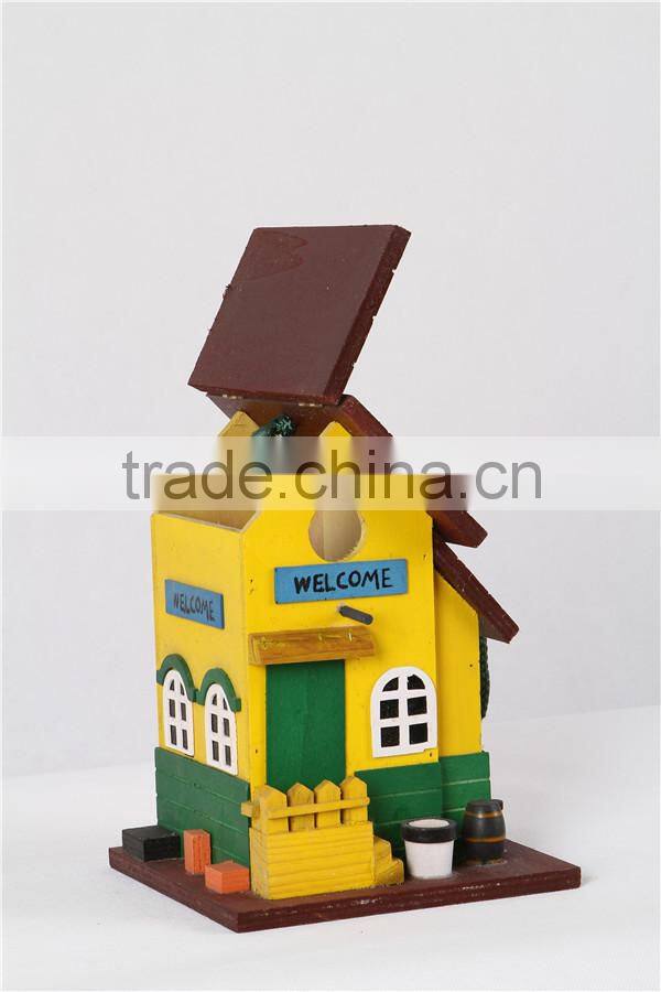 New wooden yellow colored birdhouse for decoration birdcage