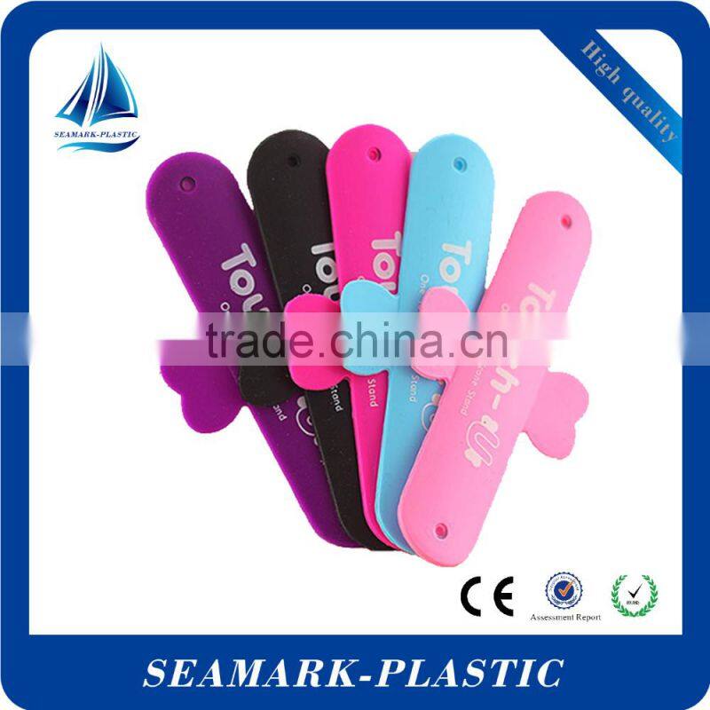 2016 cheap promotional silicone touch u mobile phone back stander giveaways