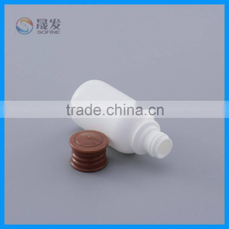 Round small cosmetic plastic bottle