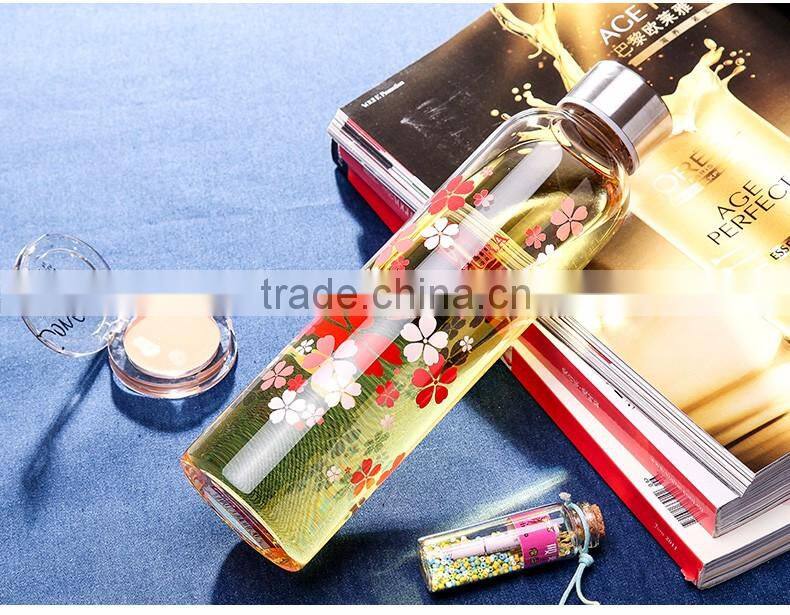 Bright and easy-to-hold reusable 35 oz.purity glass water bottles with protection silicone sleeve