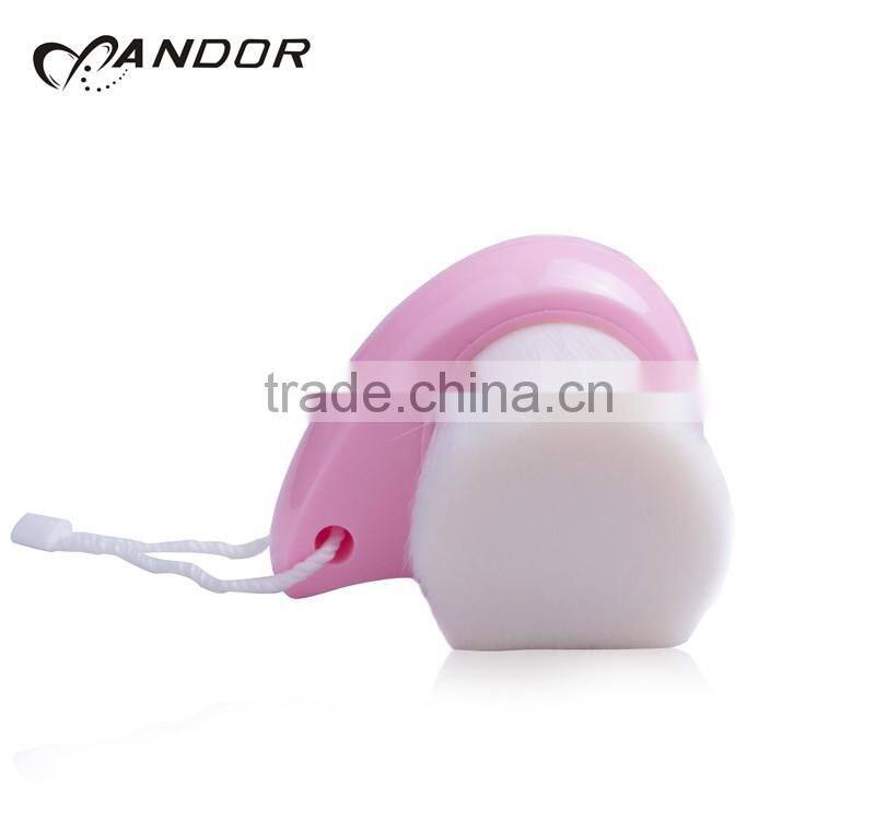Patent design pink handle andor face cleansing brush