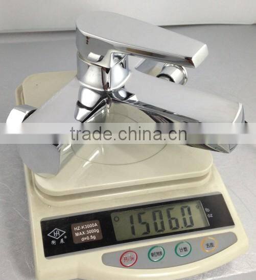 Exposed wall mounted bath and shower mixer tap with divertor