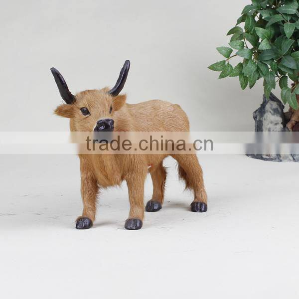 new designed artificial cartoon cow with horn