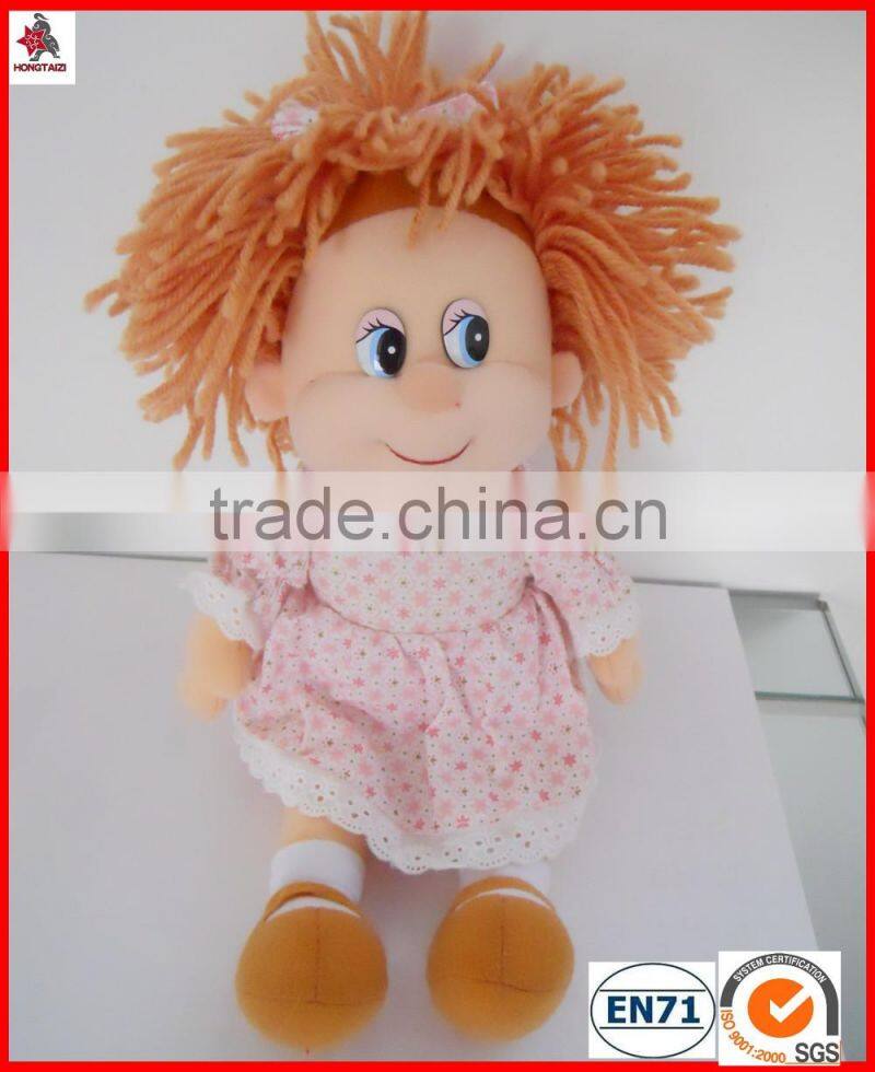 plush baby toy with a cap