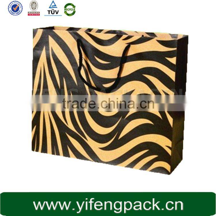 Low price popular glossy lamination white colour elegant newest advertising shopping paper bag in Guangdong