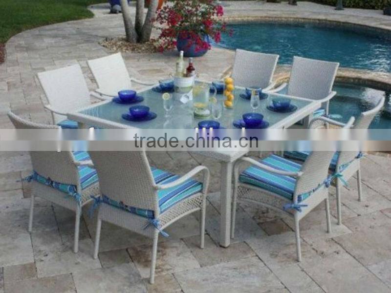 space-saving rattan hideaway dining table and chair set