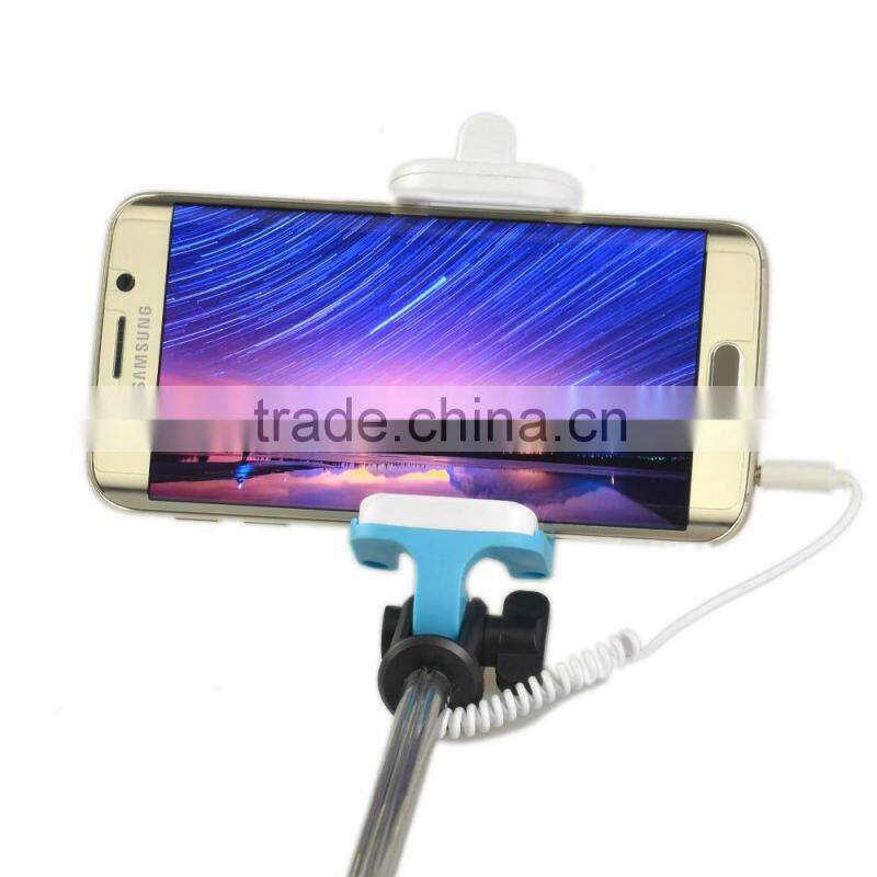 Monopod with mobile phone holder and built-in shutter release