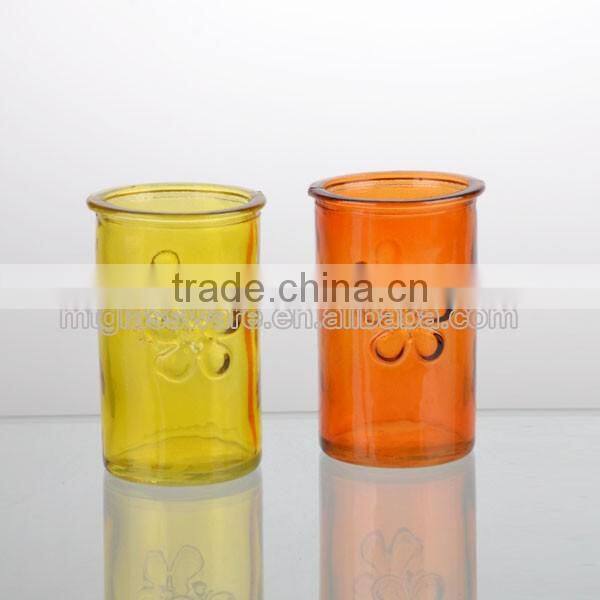 2colorful machie made with a four-leaf clover press votive candle holder