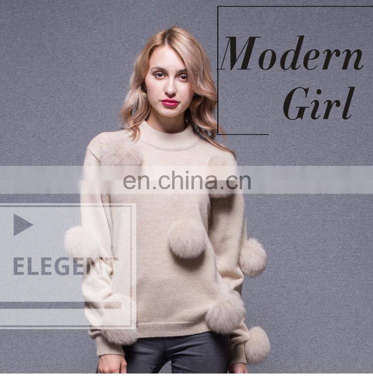 Woman black custom pullover sweater with a lot fox fur ball