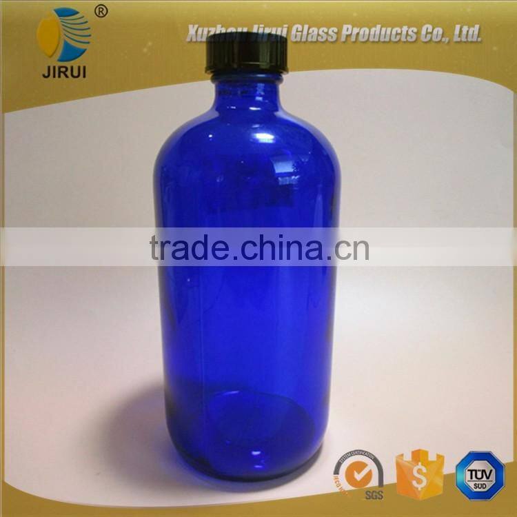 16oz blue glass boston bottle with bakelite cap